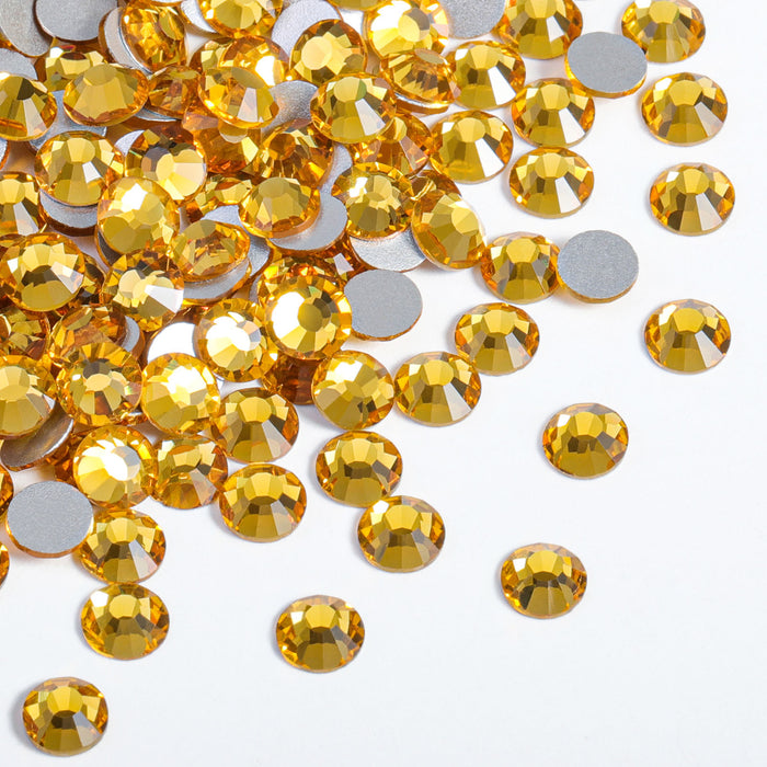 Beadsland - Diamantes de imitación de cristal con parte trasera plana, gemas redondas para decoración de uñas y pegamento para manualidades, color topacio